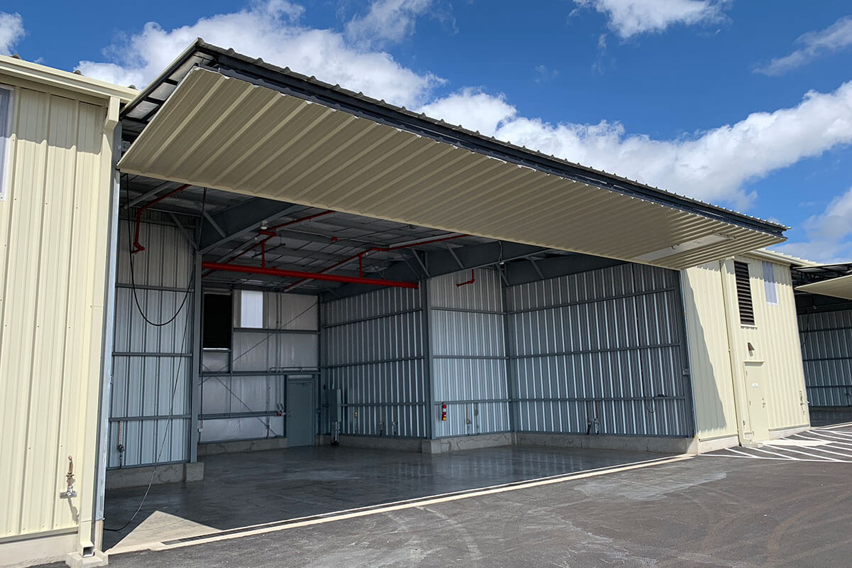 Hangar with open door at the Kalaeloa Airport 