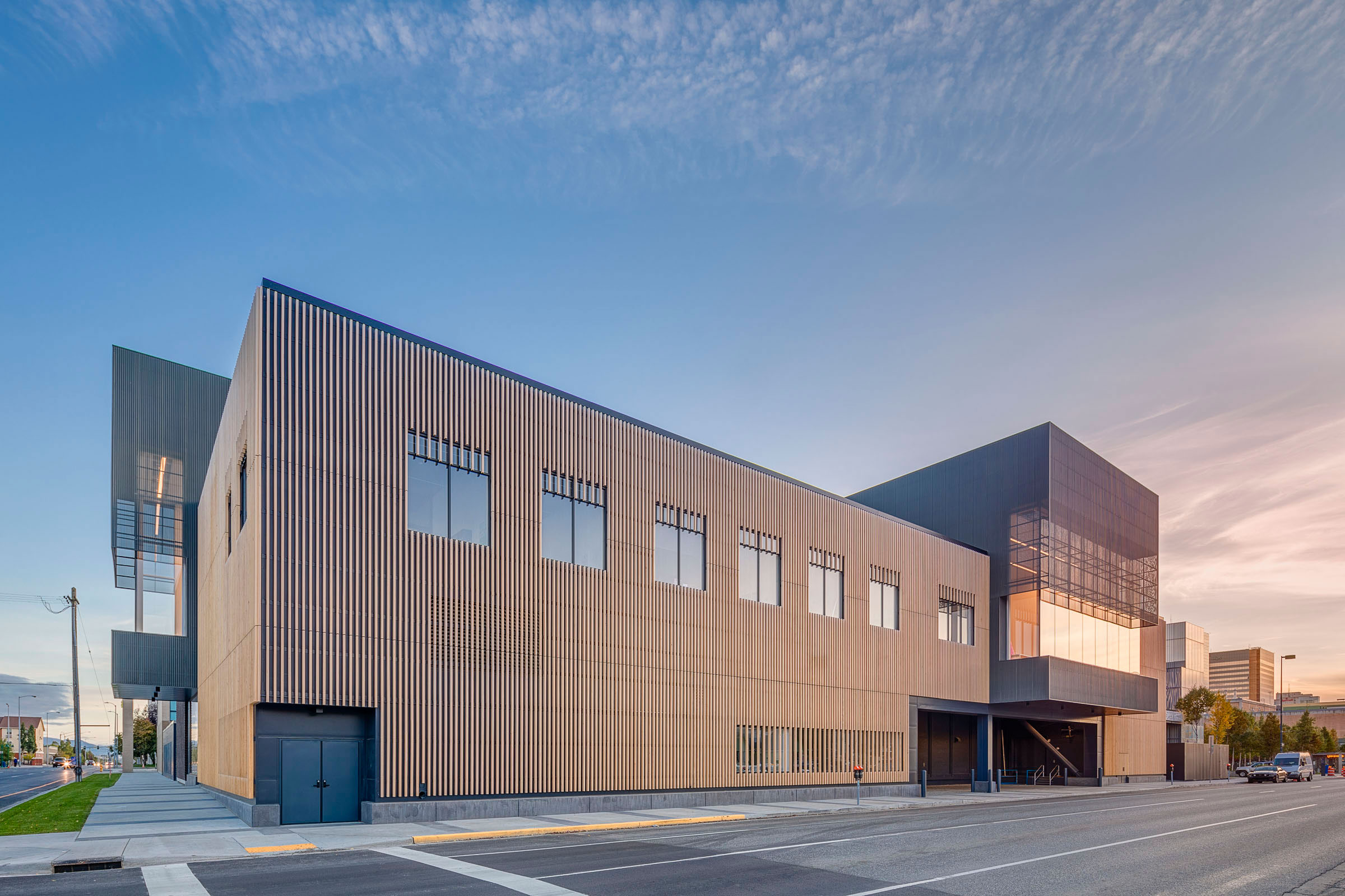 Exterior view at night of the Anchorage Museum Expansion